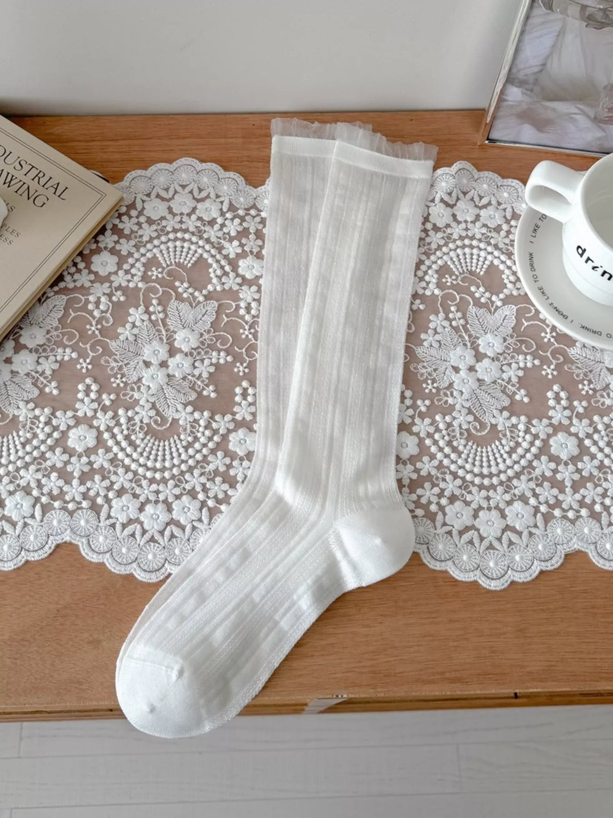Sheer mid-calf socks from Trendsi, lightweight and translucent, perfect for stylish and breathable everyday wear.