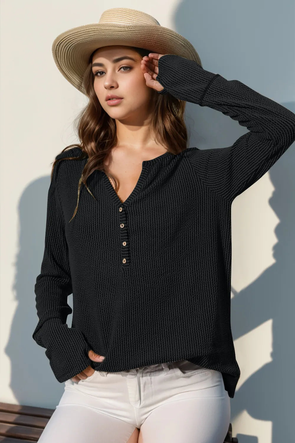 Long sleeve T-shirt by Trendsi featuring notched thumbhole design and full size fit, displayed on a model.