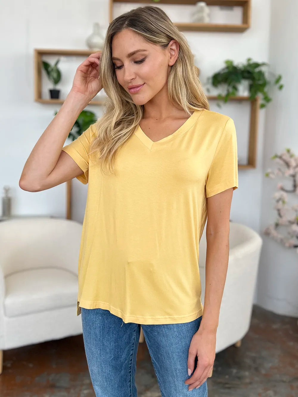 Basic Bae Bamboo V-Neck High-Low T-Shirt by Trendsi, full-size, lightweight bamboo fabric, with a relaxed fit and stylish high-low hem.