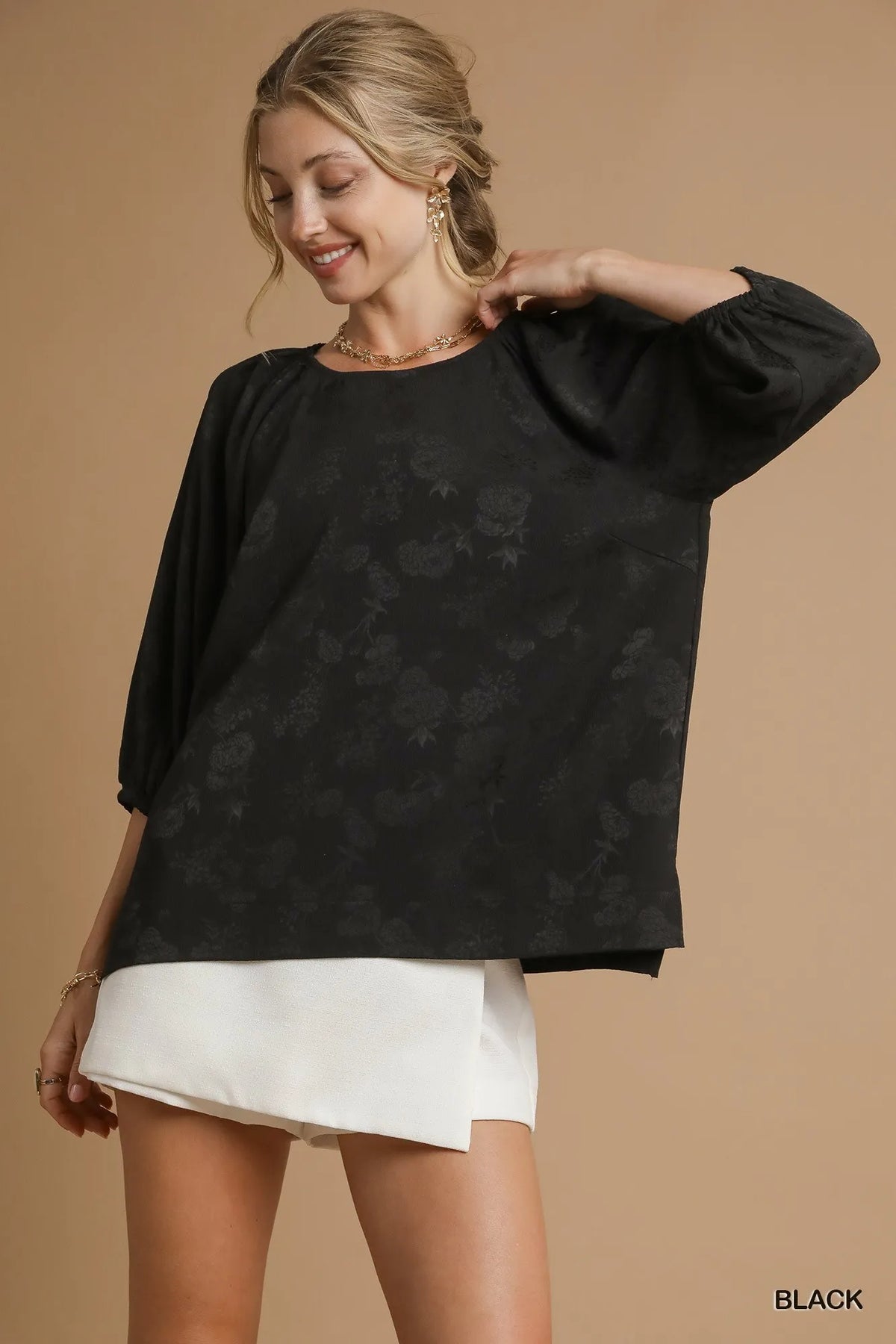 Umgee satin jacquard balloon sleeve blouse featuring elegant design and intricate fabric details, perfect for stylish outfits.