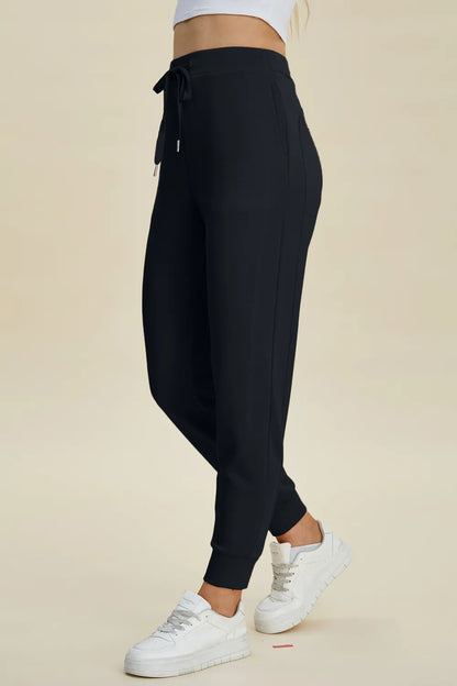 Basic Bae full-size air scuba joggers with high waist and drawstring, featuring a sleek, comfortable fit in trendy fashion style.