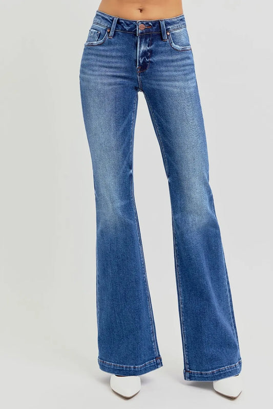 Risen full size low rise flare jeans with pockets, featuring a classic denim look and a flattering fit, by Trendsi.