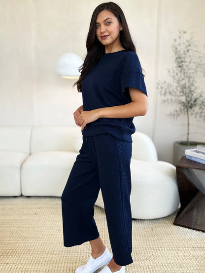 Trendsi Double Take full size textured short sleeve top and matching pants set, stylish and comfortable loungewear or casual outfit