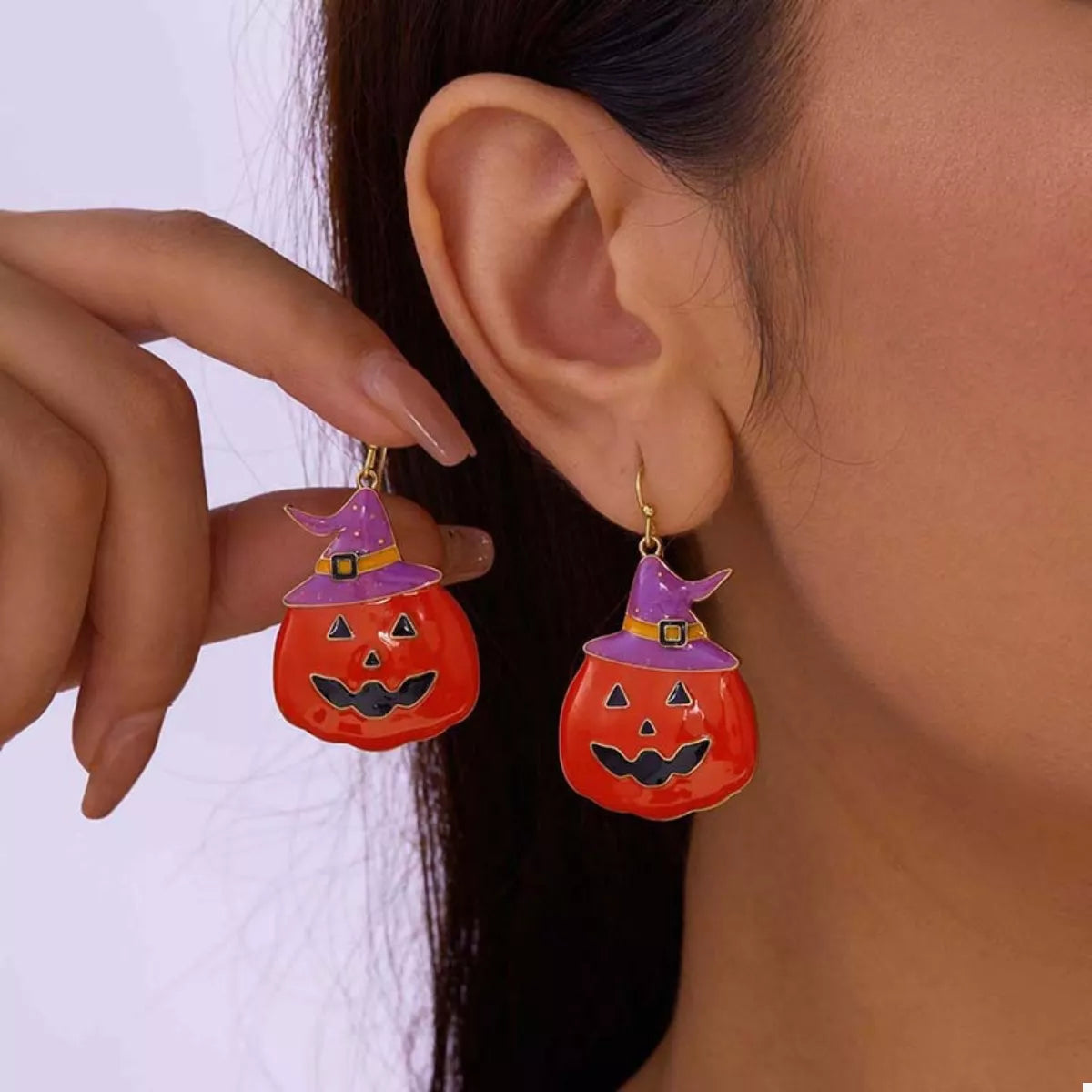 Halloween pumpkin dangle earrings featuring orange pumpkin charms and black accents, stylish jewelry by Trendsi for festive occasions.