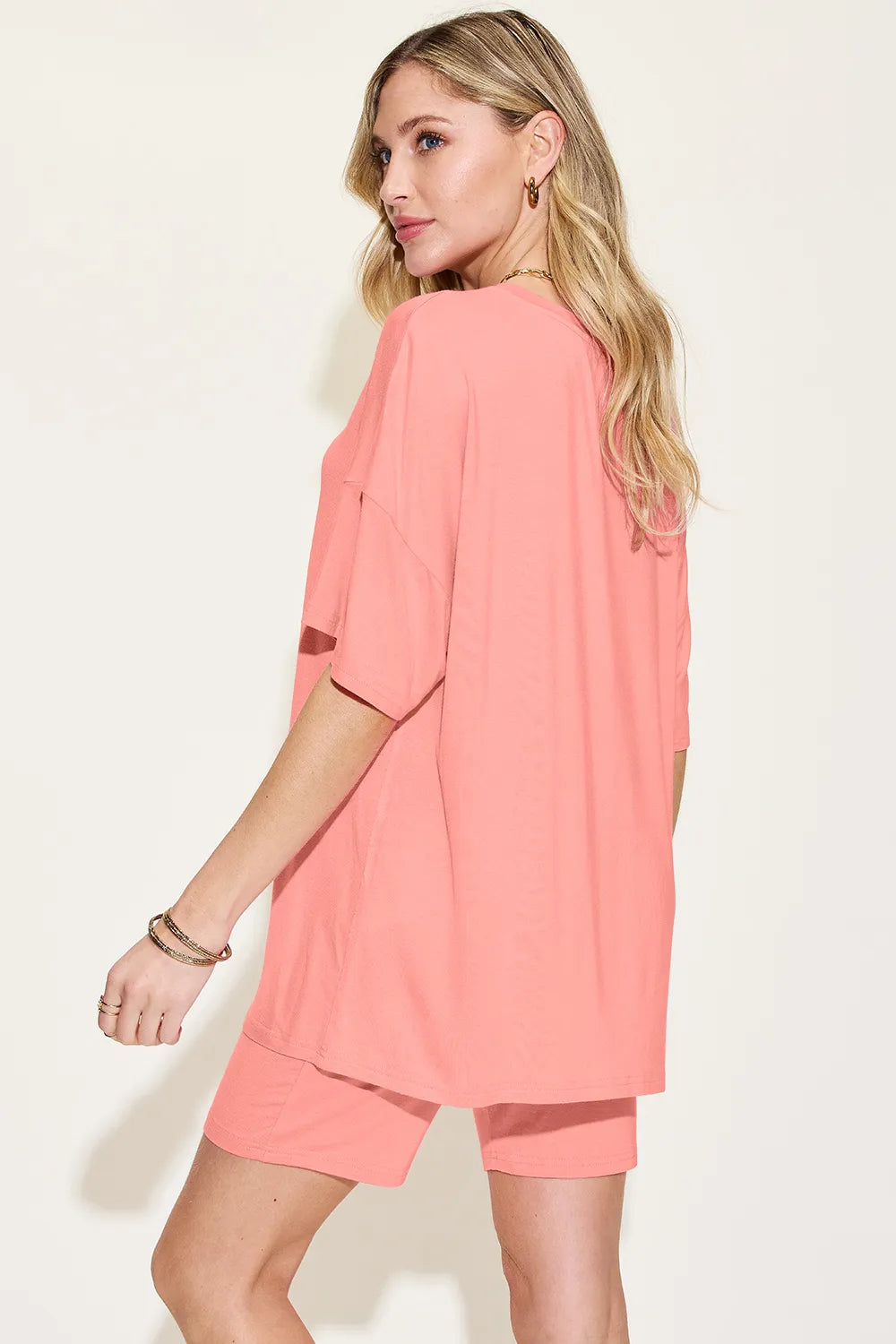 Basic Bae Bamboo full-size V-neck drop shoulder T-shirt and shorts set by Trendsi, featuring a relaxed fit and comfortable bamboo fabric.