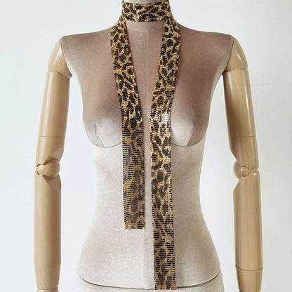 Sequin Glamour Scarf by Trendsi featuring shiny, sequined fabric with a stylish drape and vibrant sparkle.