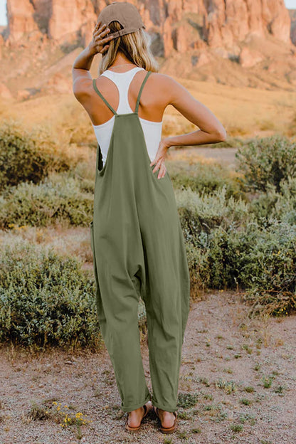 Full-length Trendsi double take sleeveless jumpsuit with V-neck, pockets, and a fitted waist, displayed on a model.