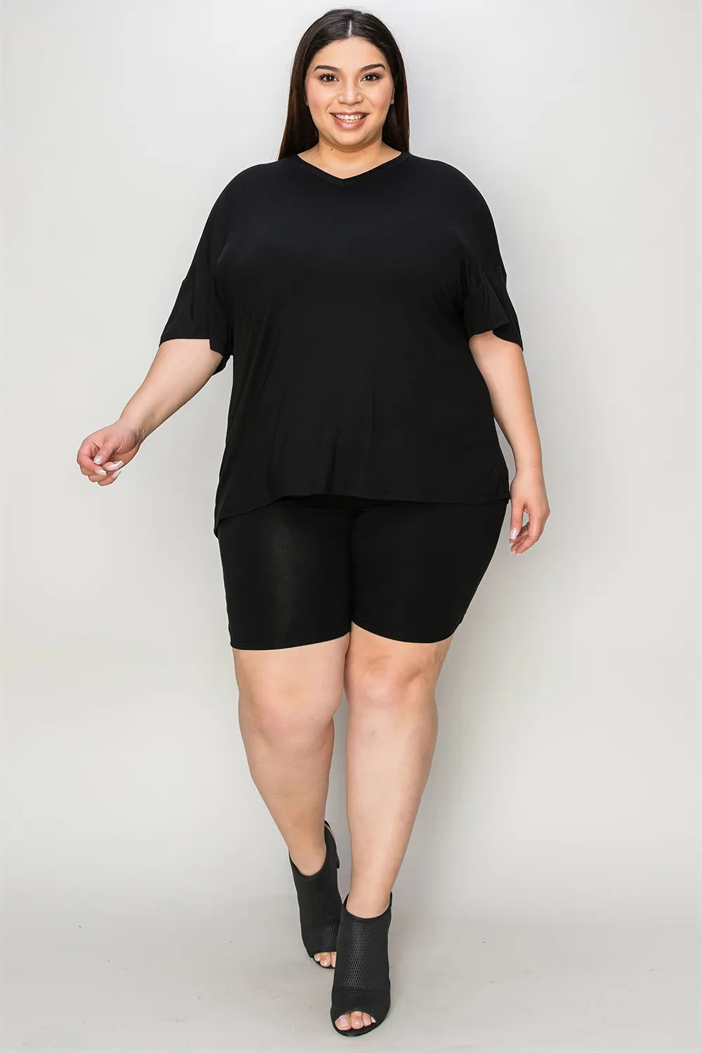 Basic Bae Bamboo full-size V-neck drop shoulder T-shirt and shorts set by Trendsi, featuring a relaxed fit and soft bamboo fabric.