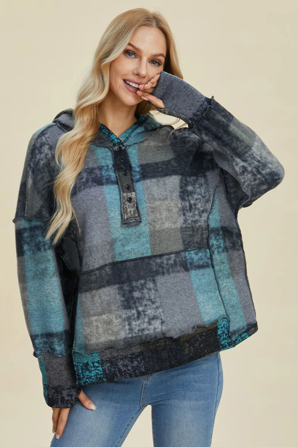 Plus size plaid fleece hoodie with dropped shoulders and full size fit, featuring a cozy, casual style from Trendsi.