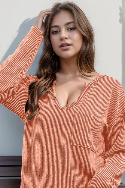 Long sleeve T-shirt by Trendsi featuring black and white striped pattern with a notched collar and relaxed fit.