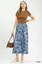 Umgee stone wash wide-leg crop pants in denim, featuring a relaxed fit and stylish design, perfect for casual wear.