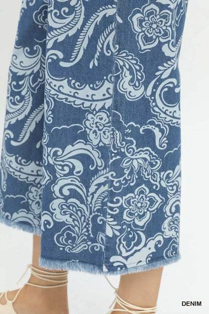 Stone wash wide leg crop pants by Umgee featuring denim fabric, relaxed fit, and trendy style.