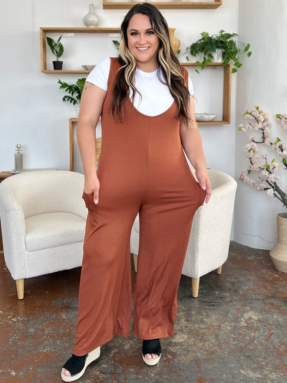 Plus size Trendsi Double Take sleeveless wide leg jumpsuit with pockets, full length, comfortable and stylish for casual wear.