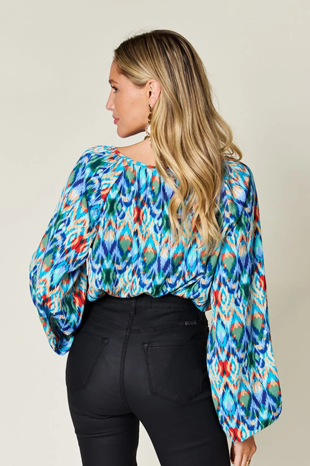 Printed balloon sleeve blouse from Trendsi featuring a double take full size design with vibrant print and stylish balloon sleeves.