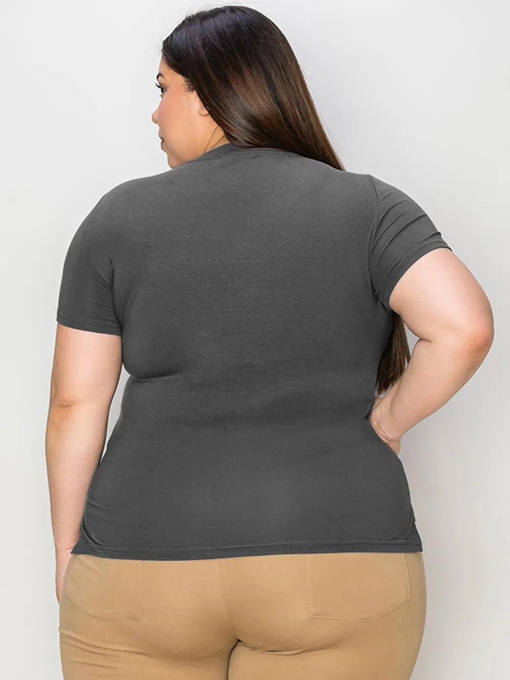 Basic Bae full size V-neck high-low T-shirt by Trendsi, shown in black with a relaxed fit and stylish V-neck design.