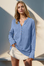 Black Double Take long sleeve T-shirt with notched thumbholes and a fitted style, by Trendsi.