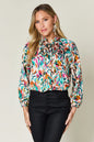 Plus size Trendsi Double Take printed button-up long sleeve shirt with a stylish full-size design and vibrant pattern.