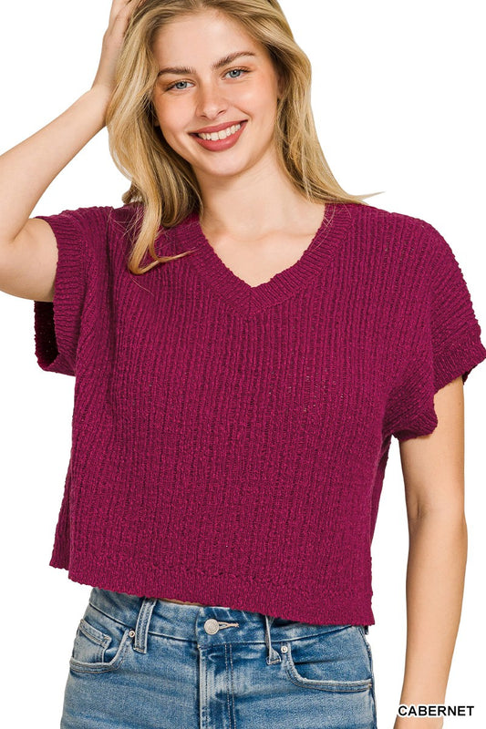 Trendsi Zenana textured knit V-neck cropped sweater in neutral color, showcasing its cozy, stylish design and V-neck detail.