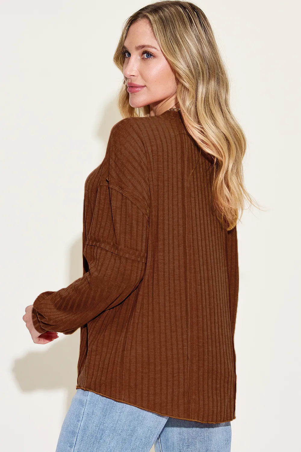 Basic Bae ribbed round neck long sleeve T-shirt by Trendsi, shown in natural light, highlighting the fitted ribbed fabric and classic style.