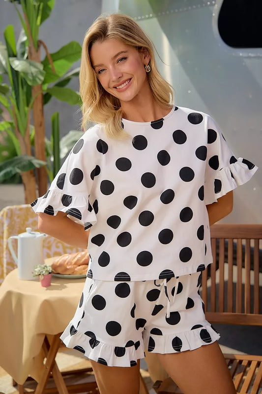 Polka dot printed ruffled detail top and shorts set by Trendsi, featuring a stylish and playful matching outfit for women.