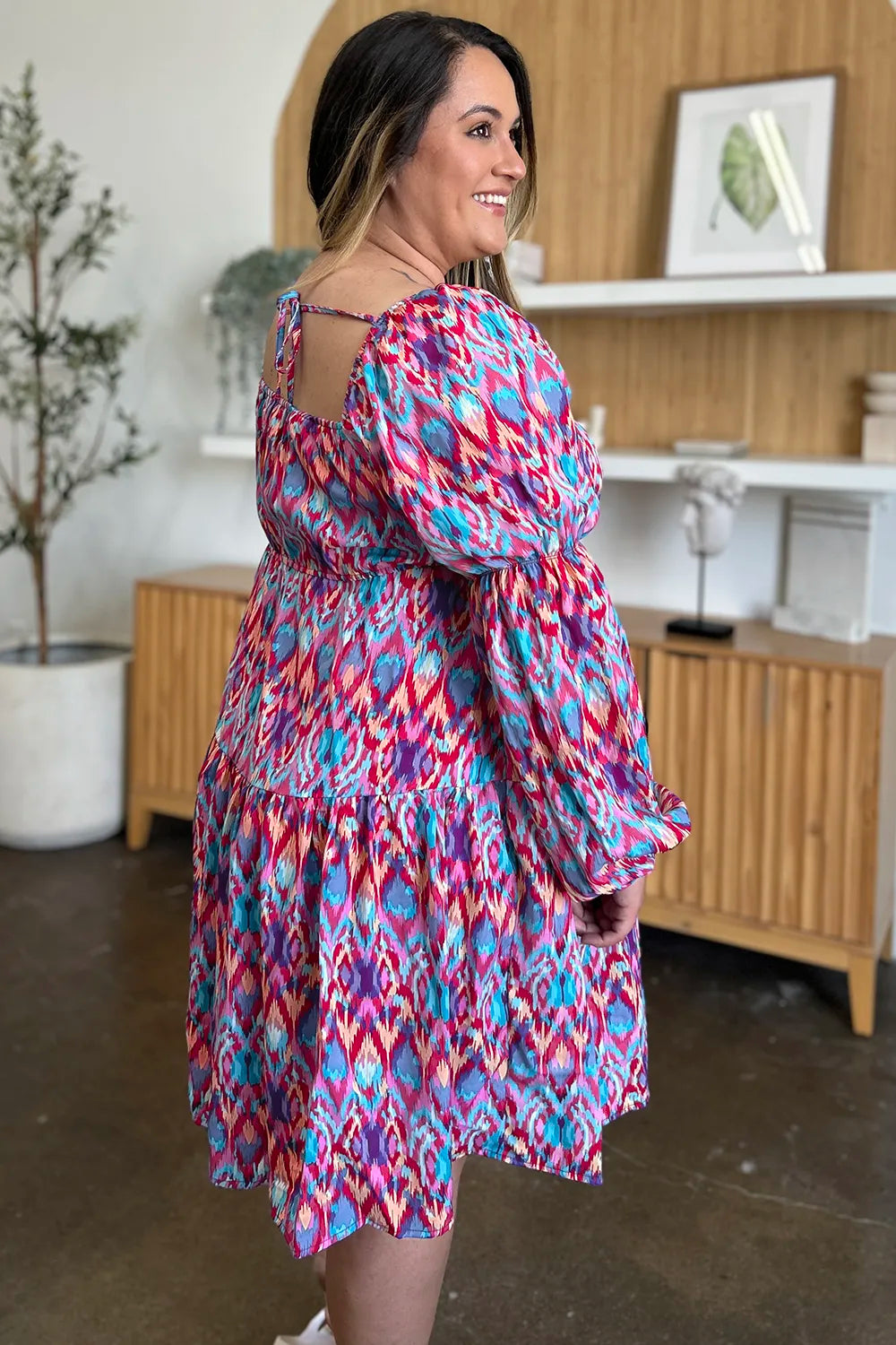 Long sleeve printed maxi dress from Trendsi, featuring a full-length design with a stylish pattern and comfortable fit.