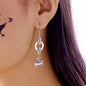 Halloween pumpkin dangle earrings by Trendsi featuring orange pumpkin charms with black accents on silver hooks.