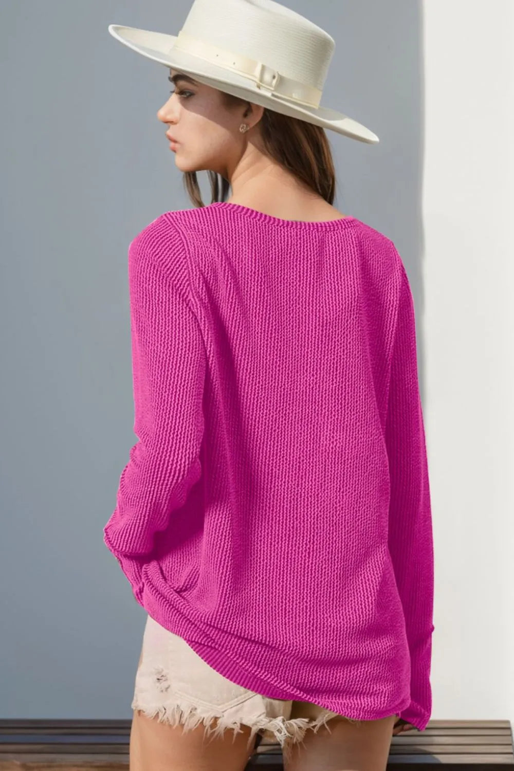 Long sleeve T-shirt with notched thumbholes by Trendsi, featuring a stylish double take design and casual fit.