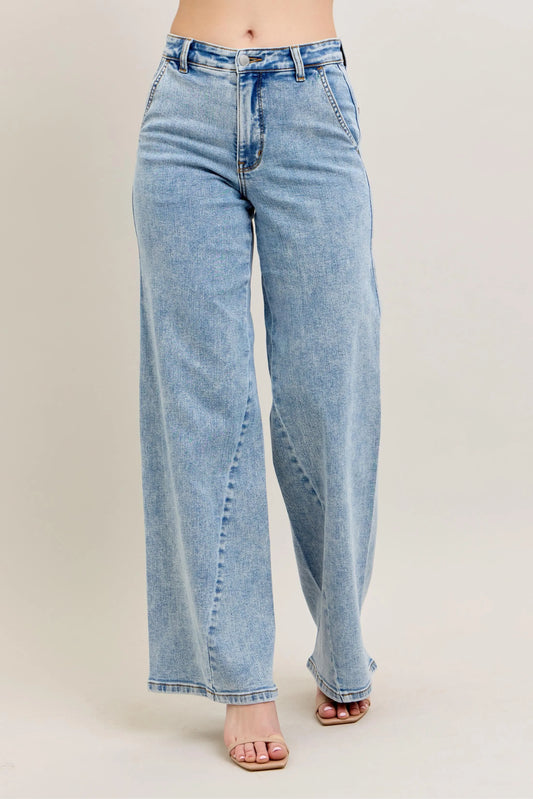Plus size Judy Blue high waist wide leg jeans with skewed inseam, featuring a relaxed fit and trendy design.