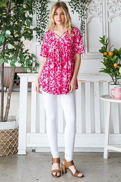 Heimish plus size short sleeve crisscross animal babydoll top, stylish and flowy with a bold animal print and relaxed fit.