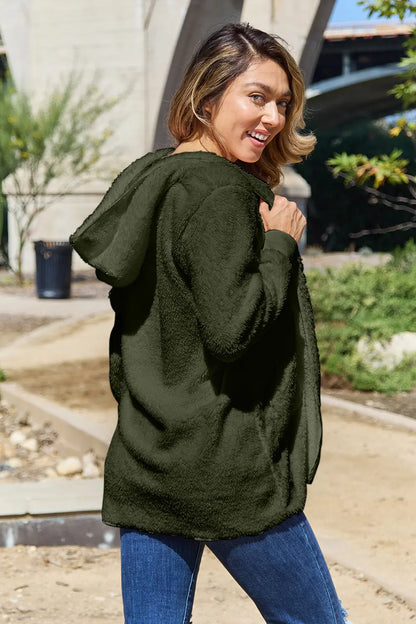 Full size Teddy hooded jacket with pockets by Trendsi, featuring soft plush fabric, hood, and front pockets for cozy warmth.