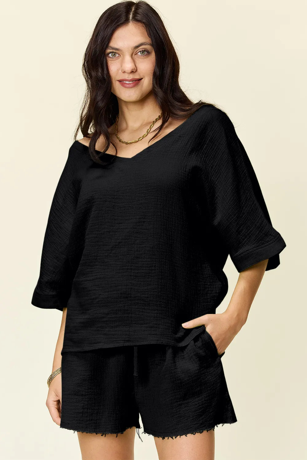 Trendsi Double Take Texture half sleeve T-shirt and drawstring shorts set, featuring a textured fabric and casual fit.