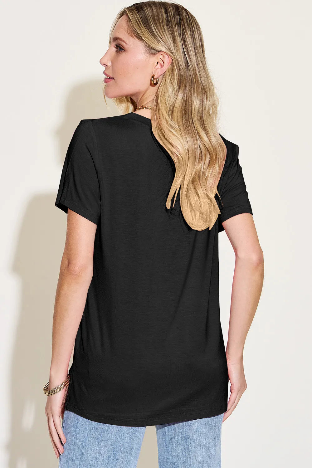 Basic Bae Bamboo V-Neck High-Low T-Shirt by Trendsi, showcasing the soft bamboo fabric, V-neck design, and stylish high-low hem.