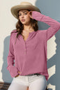Long sleeve T-shirt with notched thumbholes, double take design from Trendsi, featuring a comfortable, casual fit and stylish details.