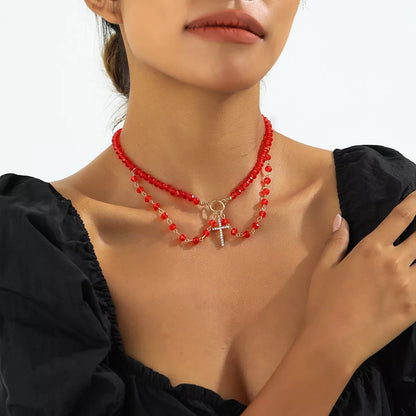 Halloween beaded cross pendant necklace with intricate bead details and a silver-tone chain, stylish accessory for Halloween costumes