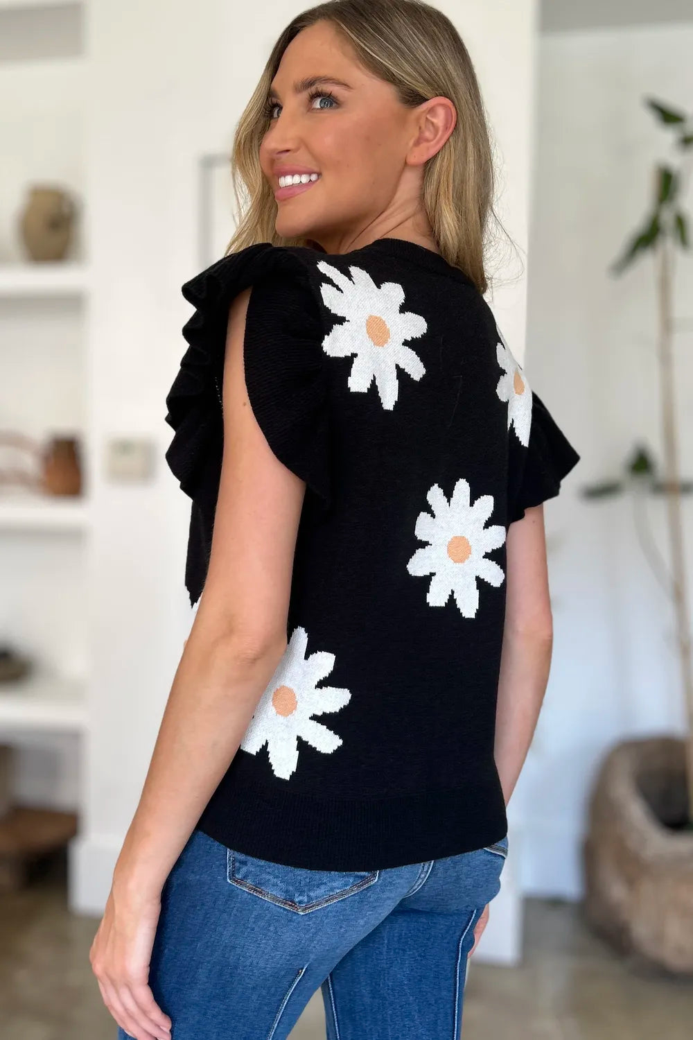Trendsi Double Take full-size ruffled flower round neck cap sleeve sweater showing floral ruffle details and soft fabric.