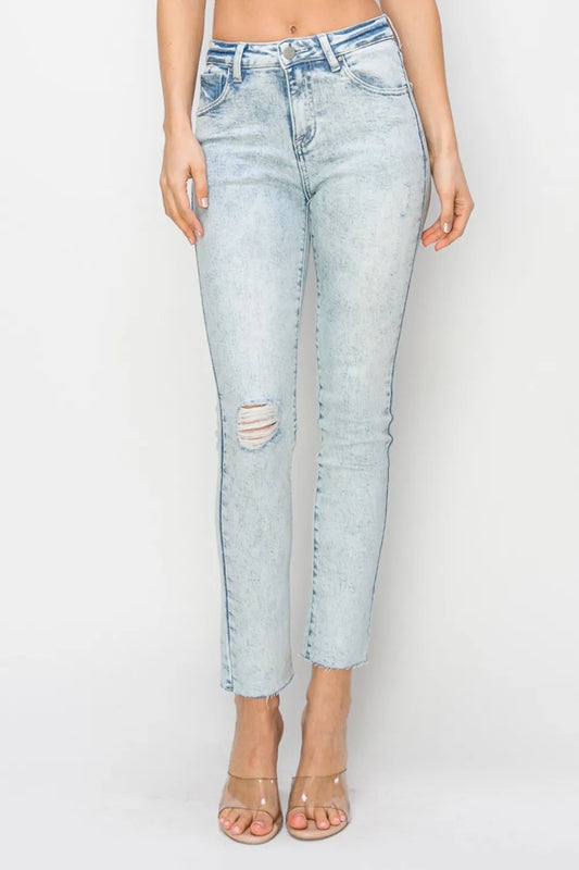 Risen full size high rise distressed skinny jeans by Trendsi with a fitted silhouette and ripped details on light denim.