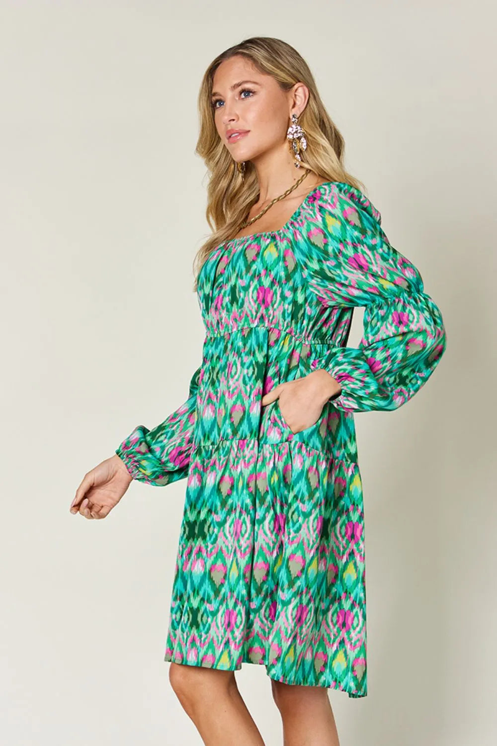 Printed long sleeve dress from Trendsi's Double Take collection, full size, featuring a stylish design and comfortable fit.