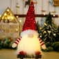 Sequin light-up faceless gnome with shiny sequins and LED lights, decorative holiday or garden ornament from Trendsi.