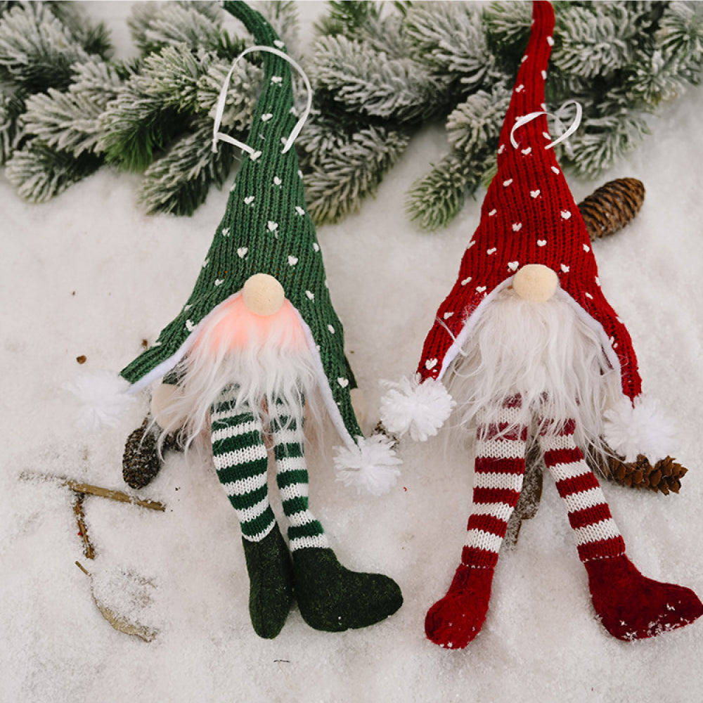 Faceless gnome with long legs and light-up feature, decorative Trendsi garden ornament with whimsical design and glowing accents.