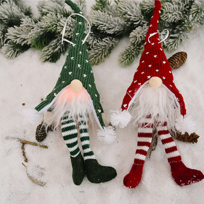 Faceless gnome with long legs and light-up feature, decorative Trendsi garden ornament with whimsical design and glowing accents.