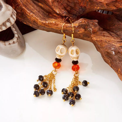 Halloween Skull Beaded Drop Earrings by Trendsi featuring black beaded skulls and dangling design for spooky style