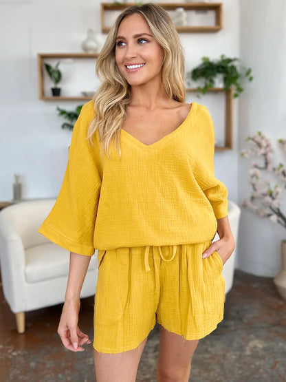 Trendsi Double Take Texture half sleeve T-shirt and drawstring shorts set, featuring a stylish casual look with textured fabric.