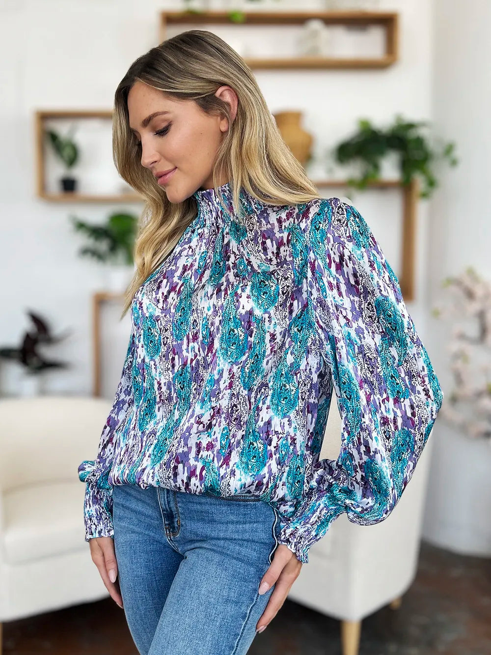 Printed smocked long sleeve blouse from Trendsi, featuring a full size double take design with a stylish, gathered neckline.