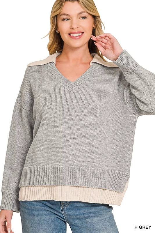 Zenana dual-look collared V-neck sweater featuring a versatile design and soft knit fabric, shown in a stylish close-up image.