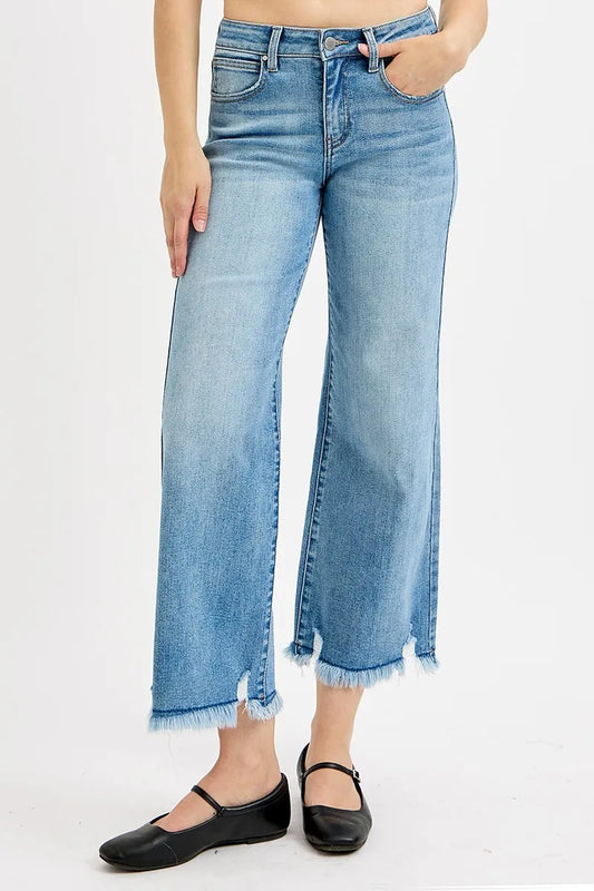 Risen mid-rise crop wide-leg jeans from Trendsi featuring a classic denim wash and relaxed fit.