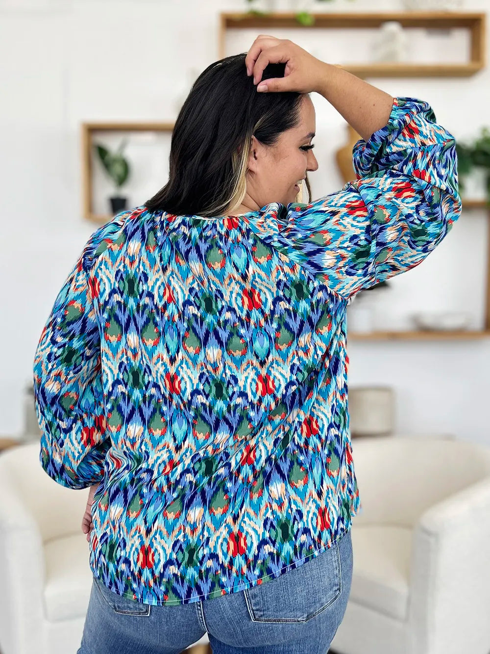 Printed balloon sleeve blouse from Trendsi, featuring a double take full size design with stylish balloon sleeves and a vibrant print.