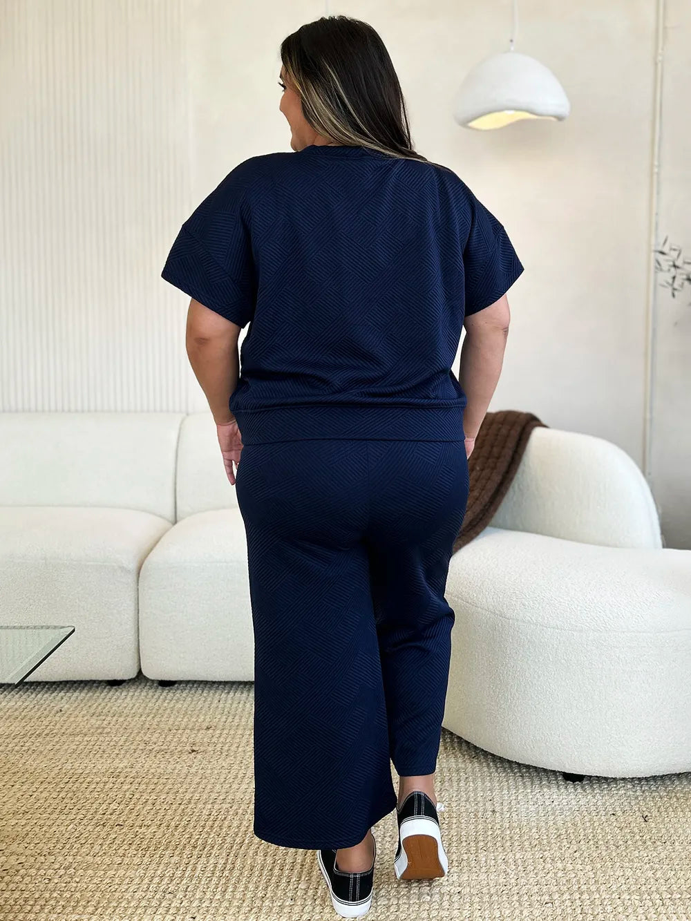 Trendsi Double Take full size textured short sleeve top and matching pants set, stylish and comfortable casual wear.
