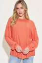 Basic Bae ribbed round neck long sleeve T-shirt by Trendsi, shown in full size with a fitted ribbed design and long sleeves.