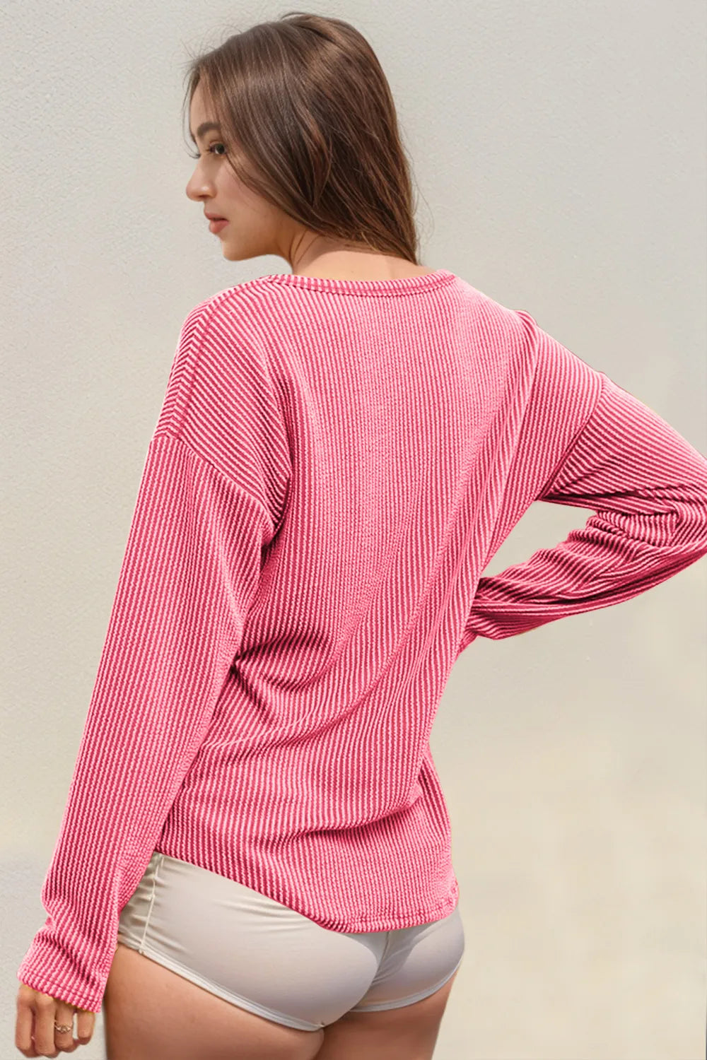 Striped long sleeve T-shirt with notched neckline by Trendsi, featuring a stylish double take design and casual fit.