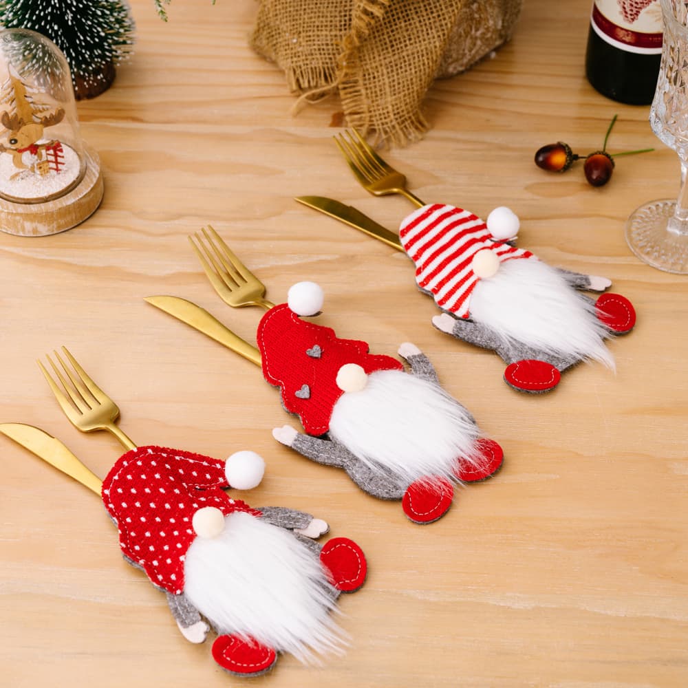 Set of three faceless gnome cutlery holders from Trendsi, featuring whimsical gnome figures for kitchen organization.